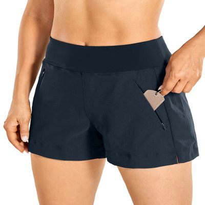 CRZ YOGA Women's Lightweight Mid Rise Hiking Shorts 4'' - Stretch for Athletic Summer Travel Outdoor Golf with Zip Pockets True Navy X-Small