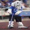 SPOTSOUND White unicorn REDBROKOLY Mascot in blue and black outfit
