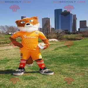 SPOTSOUND Orange and white fox REDBROKOLY Mascot in yellow sportswear