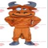 SPOTSOUND Brown and gray buffalo REDBROKOLY Mascot looking mischievous view 1