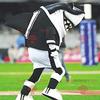 SPOTSOUND Black and white shark REDBROKOLY Mascot in sportswear