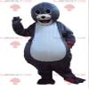 SPOTSOUND Cute and smiling gray and white otter REDBROKOLY Mascot view 1