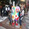 SPOTSOUND Giant white tooth REDBROKOLY Mascot stained with colors view 1