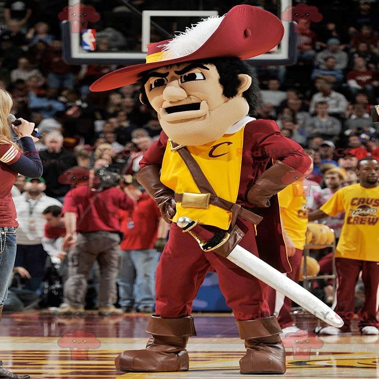 SPOTSOUND Musketeer REDBROKOLY Mascot in traditional red and yellow dress
