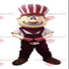 SPOTSOUND Smiling man REDBROKOLY Mascot dressed in purple and white