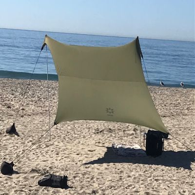 Neso Portable Beach Tent Sun Shelter with Sand Anchor - Lightweight Beach Shade Canopy - Easy Setup for Family Outings - Patented Reinforced Corners - UPF 50+ Sun Protection - 7 x 7ft - Army Green
