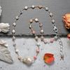 A Dainty Genuine Pink Opal Short Necklace with a Focal Cultured Freshwater Baroque Pearl Pendant. view 2