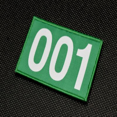 001 Woven Morale Patch Green Hook Loop Backing Measuring 4" x 2.45"