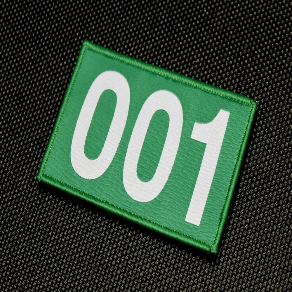 001 Woven Morale Patch Green Hook Loop Backing Measuring 4" x 2.45"