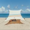 Neso Grande Portable Beach Tent Sun Shelter - Lightweight Beach Shade Canopy - Easy Setup for Family Outings - Patented Reinforced Corners - UPF 50+ Sun Protection - 7ft Tall, 9 x 9ft - Rainbow view 1