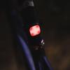 Knog Blinder Mini Rear Bike Light - Compact USB Rechargeable Bike Tail Light, 30 Lumen COB LED, 8 Flash Modes, Ultralight 17g, IP67 Waterproof, 300m Visibility, 30-Hour Runtime, Cross view 4