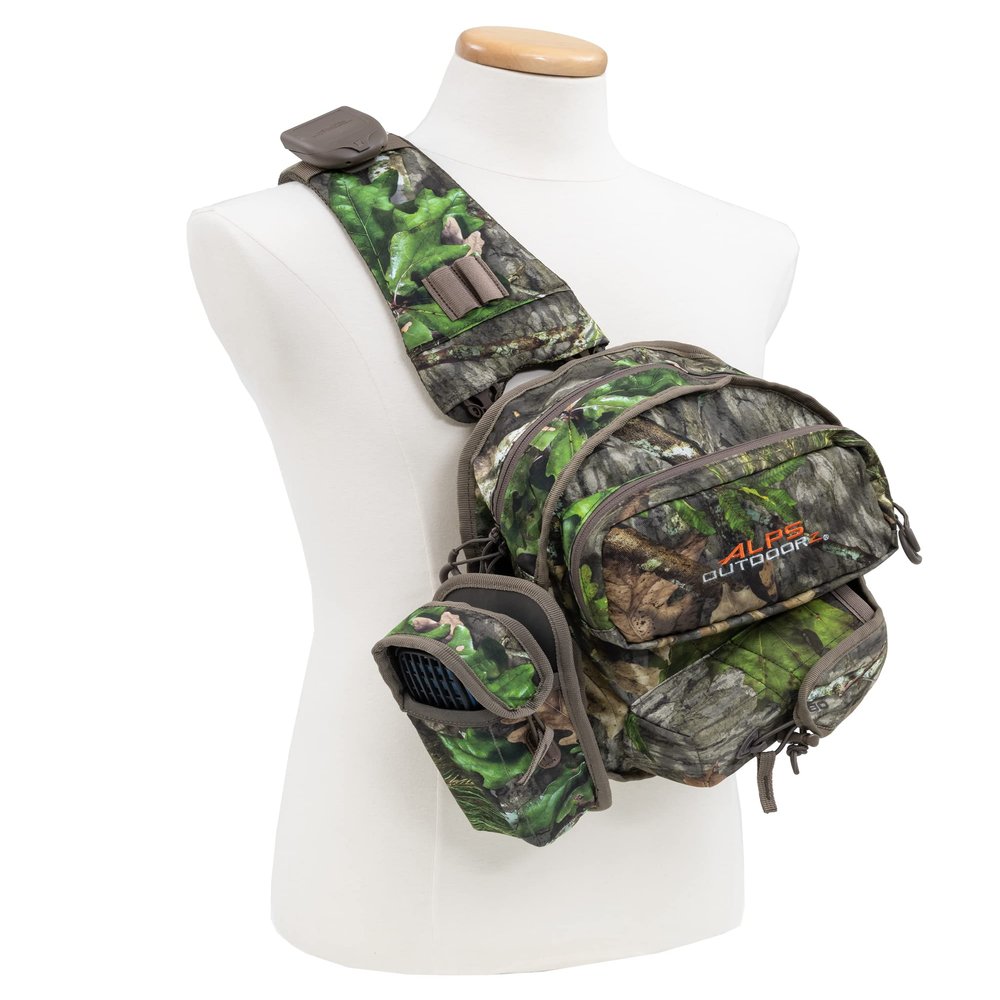 ALPS OutdoorZ Ambush Crossbody Sling Bag Featuring Lightweight Hunting Design and Ambidextrous Shoulder Strap, Interior Mesh Pockets, Attachment Points, Mossy Oak Obsession