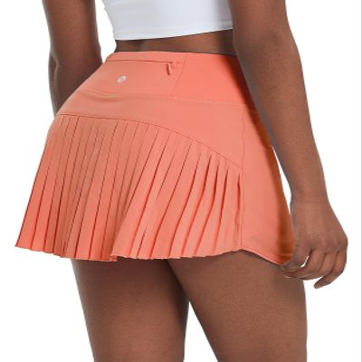 baleaf Women's Pleated Tennis Skirts High Waisted Lightweight Athletic Golf Skorts Skirts with Shorts Pockets Scorched Red Coral Large