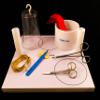 Sim*Tie Learning System - Complete Suture Tying Training Module - Includes Knot Tying Board, Instruments, Tying Suture, Simulated Tissue, Training Guide. Medical Education & Training Only. view 1