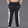 Mens Loose fit Athletic Pants Elastic Waistband Taper Lightweight Sweatpants Causal Stylish Workout Joggers Zip Pockets Black view 2