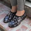 Sloggers Original Waterproof Rain and Garden Shoe for Women Outdoor Slip-On Garden Clog - Made in The USA with Premium Comfort Insole and Arch Support - Paw Print Black/White, Size 9 view 2