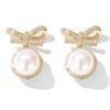 14k Gold Ribbon Bow Stud Earrings for Women cubic zirconia Dainty Gold Plated Pearl Earring for Women Jewelry (gold) view 1