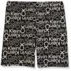 Calvin Klein Girls' Performance Bike Shorts, Soft & Stretchy with Flat Waistband & Snug Fit, Black Logo Toss, 8-10 view 1
