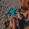 Neso Beach Table - Lightweight, Portable and Foldable Table for Beach, Camping and Outdoor Adventures - Stable Surface - with Cup Holder for Drinks and Phone Pockets - Aqua Fronds view 4
