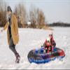 Slippery Racer Inflatable Toboggan Snow Sled for Kids with Reinforced Side Handles. view 2