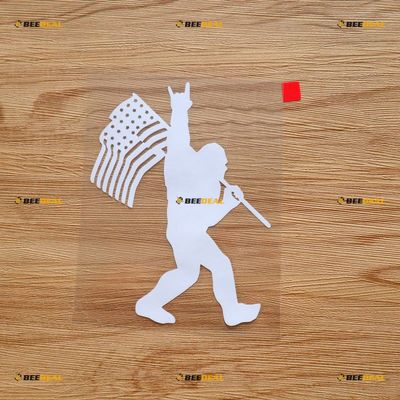 Bigfoot Sasquatch Rock On Holding American Flag Patriotic Sticker Decal Vinyl - White 5 Inches - No Background Die Cut for Car Boat Laptop
