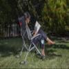 Picnic TIME NCAA Nebraska Cornhuskers Outdoor Rocking Camp Chair, XL Heavy Duty Camping Chair for Adults, (Black) view 2