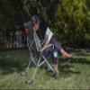 Picnic TIME NCAA Oklahoma State Cowboys Outdoor Rocking Camp Chair, XL Heavy Duty Camping Chair for Adults, (Black) view 2