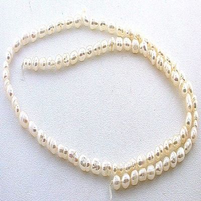 4mm to 7mm Oval Freeform Creme Freshwater Pearl 15 Inch Strand FWP118