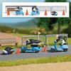 Busch 7925 HO Scale Penguins Ridomg Scooters Complete Miniature Scene - 3 Penguins, 2 Scooters, Skateboard, 4 Traffic Cones, Barricades