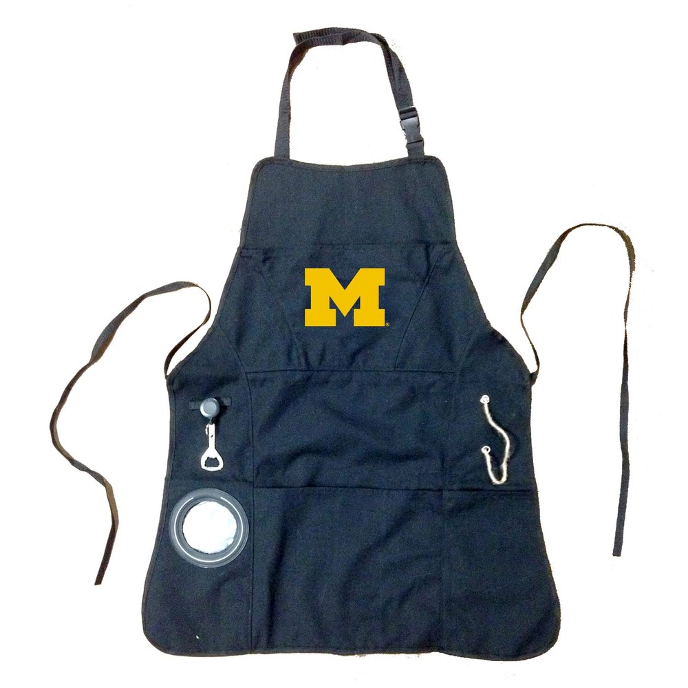 Team Sports America Outdoor Colligiate Black Grilling Apron | University Of Michigan | Made of Durable Cotton | Beverage Opener and Multi-Tool | Sports and Tailgaiting Apparel