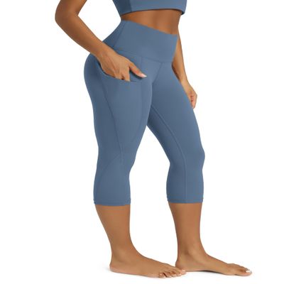 ODODOS Women's High Waisted Yoga Capris with Pockets,Tummy Control Non See Through Workout Sports Running Capri Leggings, Ink Blue, Small