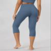 ODODOS Women's High Waisted Yoga Capris with Pockets,Tummy Control Non See Through Workout Sports Running Capri Leggings, Ink Blue, Small view 3