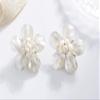 AeraVida 45mm Mother of Pearl Flower Clip-On Earrings for Women Handmade White Floral Jewelry Non Pierced Paddle Back Summer Statement Earrings Lightweight Vintage Gift view 4