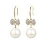 MIKAMU 14K Gold Ribbon Bow Stud Earrings for Women CZ cubic zirconia Gold Plated Pearl Earring for Women Jewelry (gold) view 1