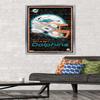 NFL Miami Dolphins - Neon Helmet 23 Wall Poster, 34L" x 22.4W", Silver Framed Version view 2
