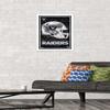 NFL Las Vegas Raiders - Neon Helmet 23 Wall Poster, 22.4L" x 14.7W", White Framed Version view 2