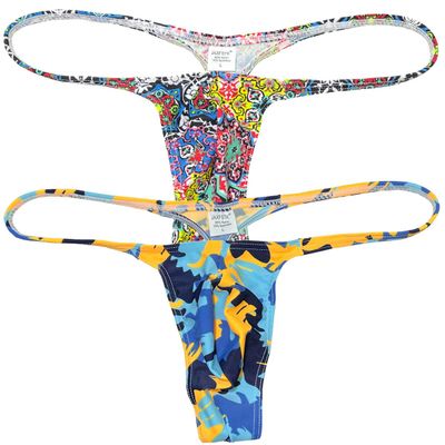 Jaxu Hot Men's Flex Micro Thong Underwear Male Slim Pouch Bikini Tangas Hombre Thin Belt G-string Minimum Coverage T-back 2-Pack(yellow medallion pattern,dinosaur) M