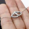 InterlockingHeartBracelet LuxuryBox MomAndSon view 3