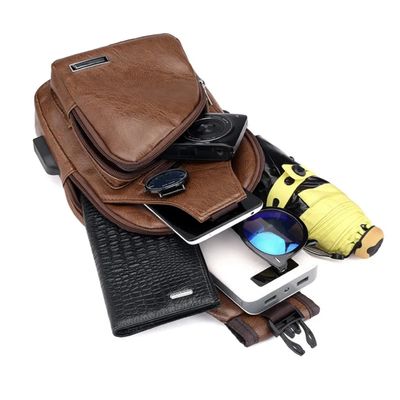 Sling Crossbody Bag for Men and Women. Hiking Daypack Multipurpose Cross body chest bag. (Brown)