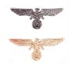 2 men's eagle wing brooches, cross brooches, men's medal shoulder badges view 1