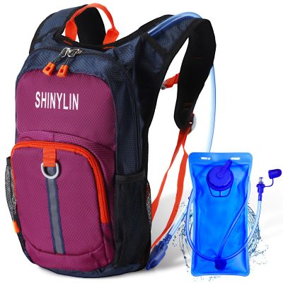 Shinylin Kids Hydration Backpack with 1.5L Water Bladder Hiking Backpack Lightweight for Boys or Girls Children Biking Climbing Running Cycling(Classic,Purple)