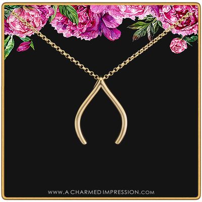 A Charmed Impression Gold Wishbone Ring Holder Necklace