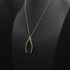 A Charmed Impression Gold Wishbone Ring Holder Necklace view 3