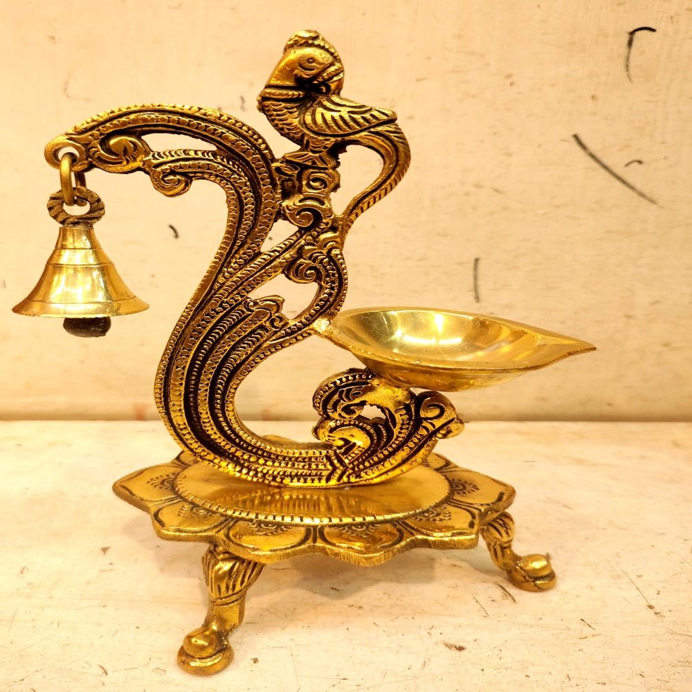 Brass Diya Antique Finish Brass Parrot Showpiece Diya with Bells and Stand .