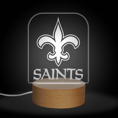 Rico Industries NFL Football New Orleans Saints Team Logo LED Desk Light Up Sign, 7 Color Changing LED Night Light, Wood Base with USB Cord Included, Ideal for Home and Desktop Decoration