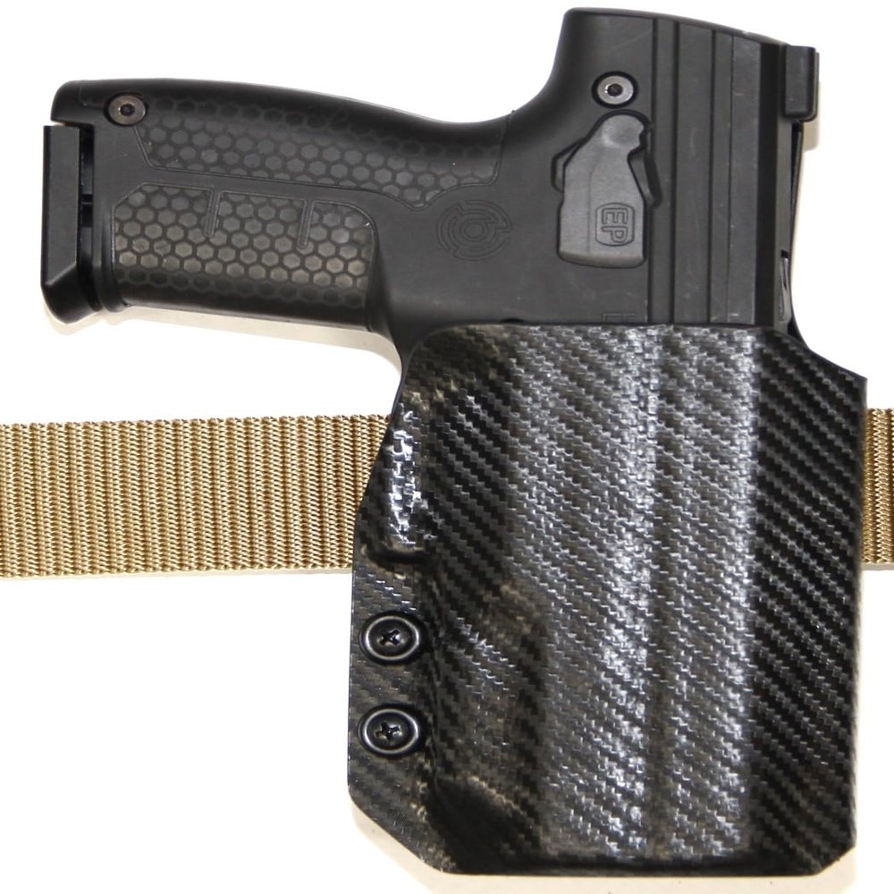 REVKEL Custom Kydex Molded OWB Belt Lock Loop Holster for Byrna EP/HD/SD/HDXL/SDXL/LE Gun. Black Carbon Fiber. Hand Crafted with Pride in Texas, USA (Byrna HD, Left Hand Draw)