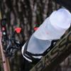Elite Cannibal XC Bio-Based Bottle Cage, Black Glossy, Red Graphic  Lightweight and Secure for All Terrains view 3