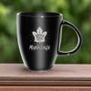 Rico Industries NHL Hockey Toronto Maple Leafs Sunburst Black 18oz Laser Engraved Ceramic Lustre Mug view 4