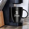 Rico Industries NCAA UCLA Bruins Sunburst Black 18oz Laser Engraved Ceramic Lustre Mug view 2