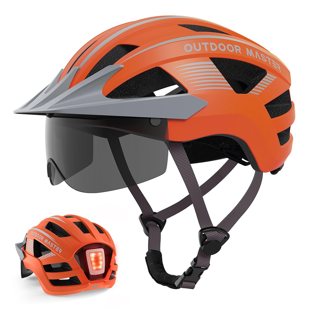 OutdoorMaster Helmets for Adults - Mountain & Road Bike Helmet with Rechargeable Safety Light, Detachable Goggles and Sun Visor - Easy to Adjust, Breathable, Lightweight - Matte Orange, Medium